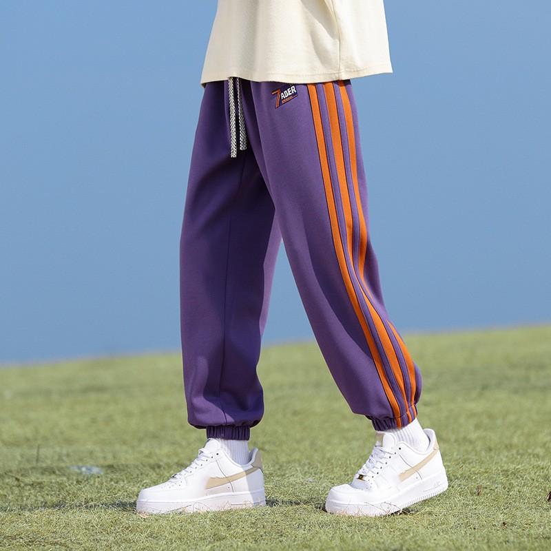 Herren Frühling und Herbst Amerikanische Retro Sport Korsett Hose Mode Marke Jugend Gerade Bein Lose Farbe Patchwork Jogginghose 3XL violett von Joom DACH