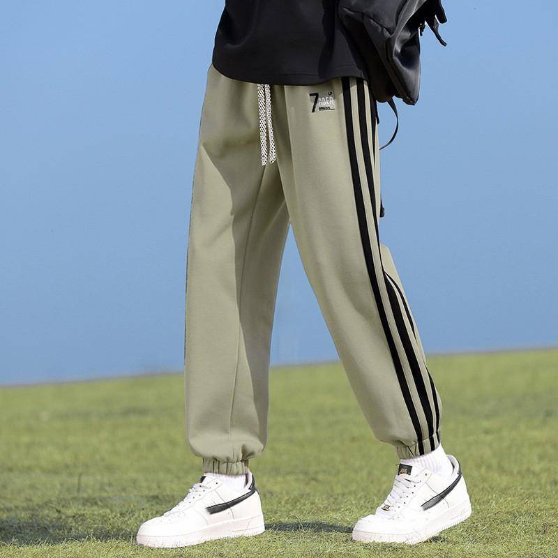 Herren Frühling und Herbst Amerikanische Retro Sport Korsett Hose Mode Marke Jugend Gerade Bein Lose Farbe Patchwork Jogginghose 4XL grün von Joom DACH