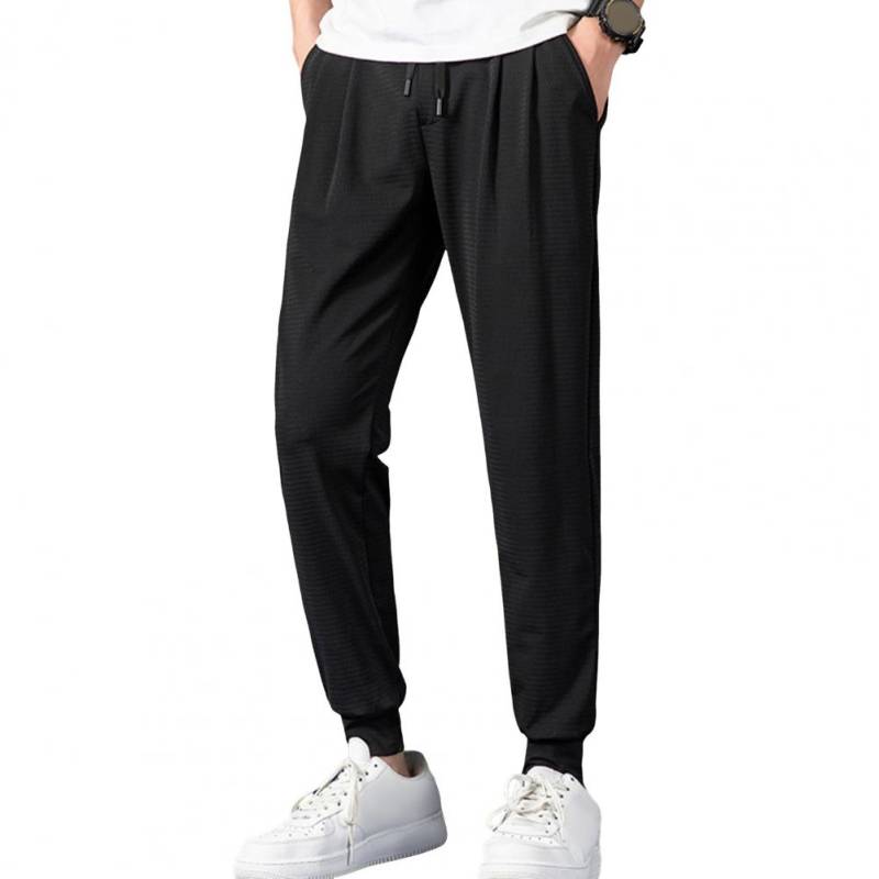 Herren Jogginghose aus Eisseide, elastischer Kordelzug in der Taille, Taschen, Sporthose, atmungsaktives Mesh, dünne Fitnesshose, Streetwear M schwarz von Joom DACH