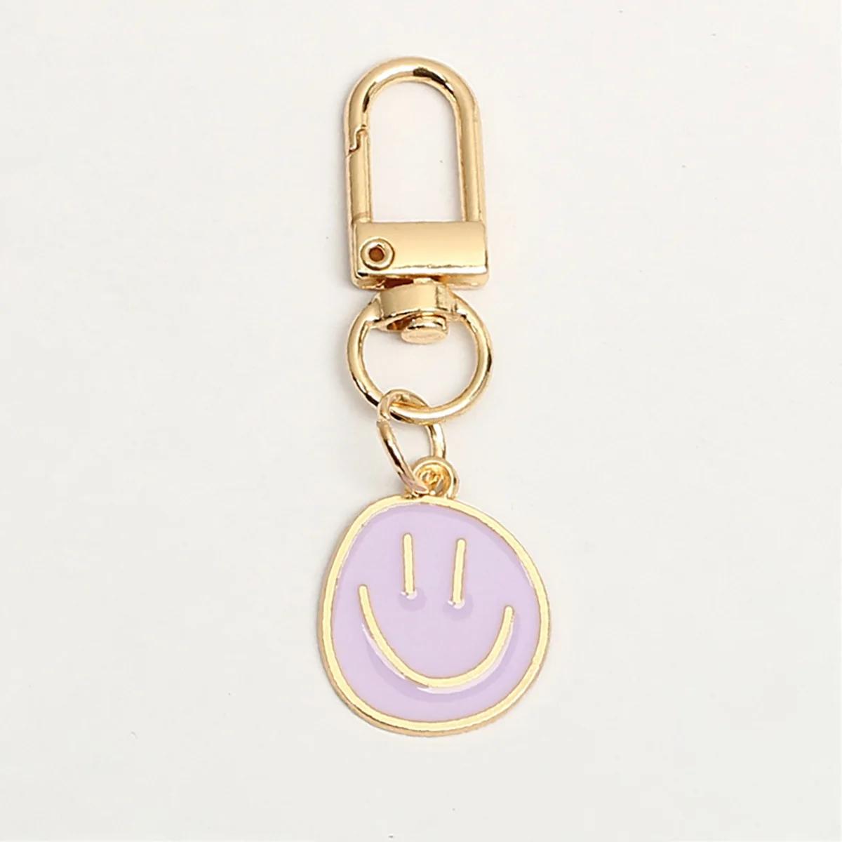 Lieblicher Smiley-Gesicht Schlüsselanhänger Niedlich Weiß Lila Gelb Rosa Blau Schwarz Emaille Metall Schlüsselring Taschenanhänger Zubehör Frauen Mädchen violett von Joom DACH