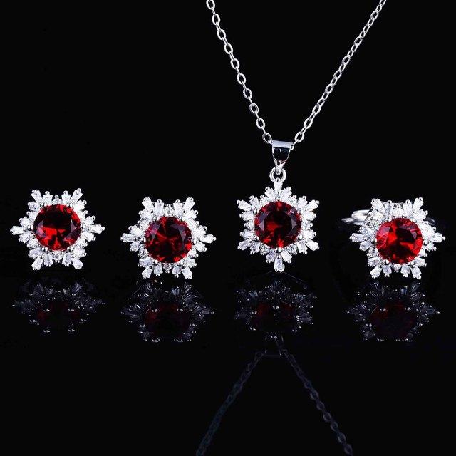Luxuriöse bunte Edelstein-Schmucksets für Damen Schneeflocken Anhänger Halskette Ohrstecker Ring Set Party-Accessoires Resizable von Joom DACH