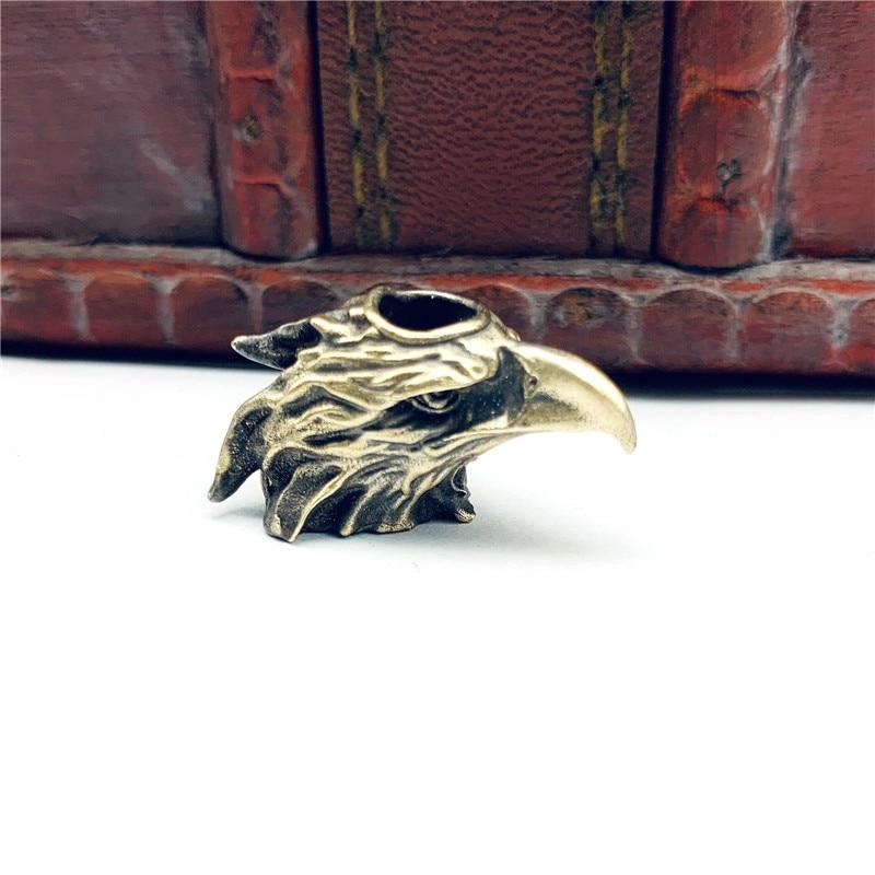 Messing Adler Kopf Messer Perle Anhänger Auto Schlüsselanhänger Outdoor EDC Werkzeug Regenschirm Seil Perle Hängen Schmuck DIY Paracord Lanyard geschenk messing/weiß von Joom DACH