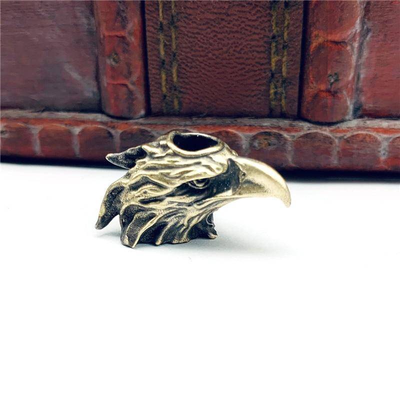 Messing Adler Kopf Messer Perle Anhänger Auto Schlüsselanhänger Outdoor EDC Werkzeug Regenschirm Seil Perle Hängen Schmuck DIY Paracord Lanyard geschenk messing/weiß von Joom DACH