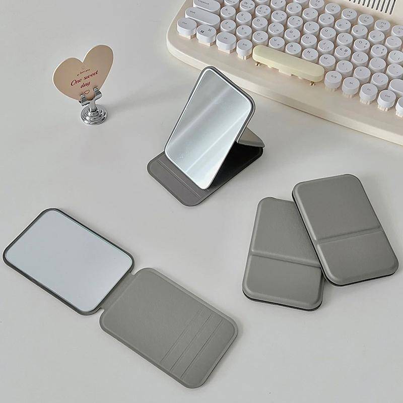 Mini-Spiegel für Damen, zusammenklappbarer Make-up-Handspiegel, tragbarer einseitiger Mini-Kosmetikspiegel, zusammenklappbar, hochauflösende Eitelkeitswerkzeuge graue von Joom DACH
