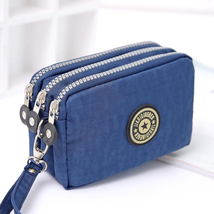 Modische tragbare Damen-Make-up-Tasche, Geldbörse, drei Reißverschluss-Geldbörsen, große Kapazität, Handytasche navy blau Modische tragbare Damen-Make-up-Tasche, Geldbörse, drei Reißverschluss-Geldbörsen, große Kapazität, Handytasche navy blau von Joom DACH