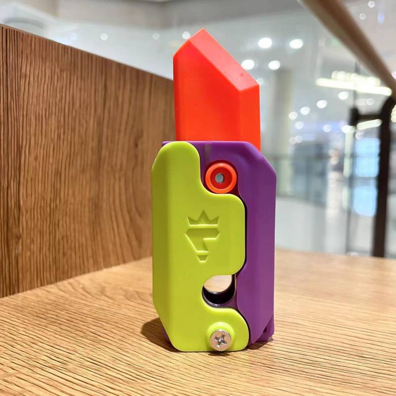 Neue 3D Schwerkraft Messer Karotte Messer Dekompression Push Karte Kleine Spielzeug Stress Relife Spielzeug Mini Modell Anhänger Dekompression Spielzeug Geschenk violett von Joom DACH