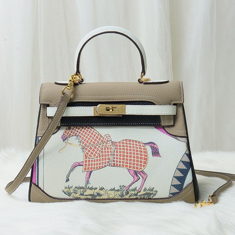 Neue Mode bedruckte Graffiti Kai Tasche Cartoon-Muster aus echtem Leder Damen Tasche Kopfschicht Leder Schulter Kreuz Schulter Handtasche 28x12x22cm von Joom DACH