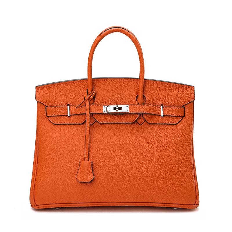 Neue Silber Taste Litschi Muster Kopf Schicht Rindsleder Platin Tasche Handheld Platin Tasche Mode Echtes Leder frauen Schulter Tasche 25cm orange von Joom DACH