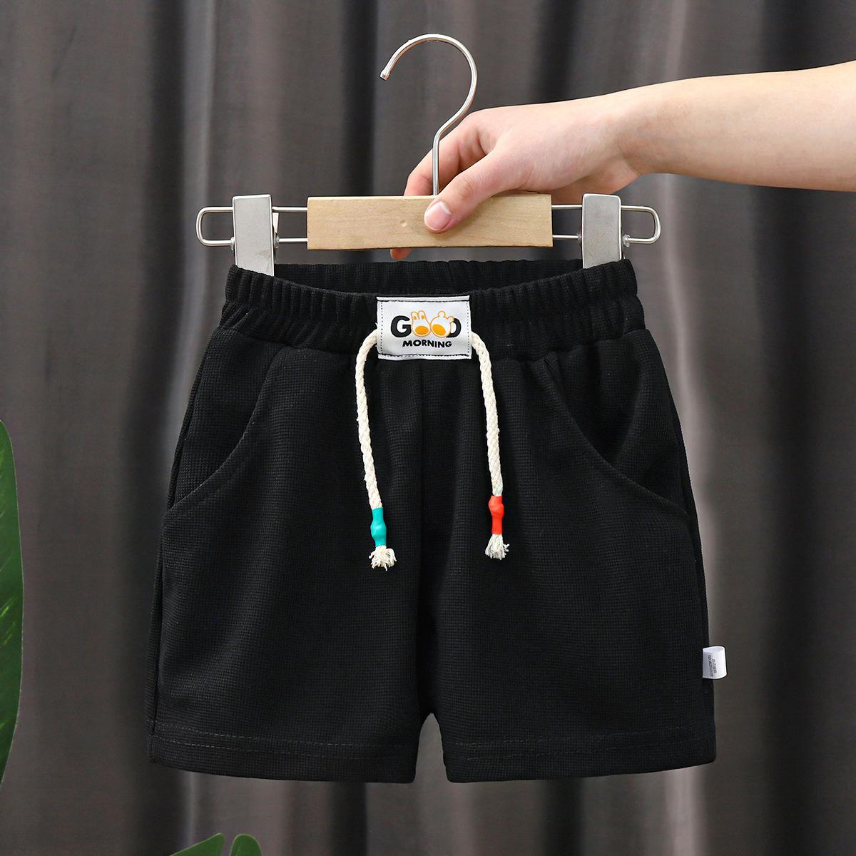 Neue Sommer Jungen Shorts Candy Farbe Strand Shorts für Kinder Casual Elastische Taille Kinder Kurze Hosen Sport Kleidung Outwear 100cm schwarz von Joom DACH
