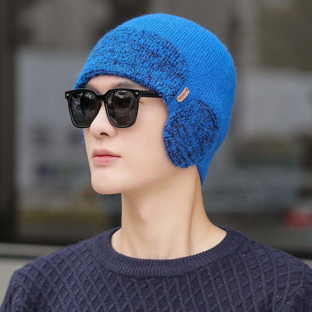 Neue Unisex-Winter-Strickmütze mit Gehörschutz, modische weiche Beanie-Mütze, für Männer und Frauen, Outdoor-Sport, Ohrenklappen-Mütze, klassisch, warm halten 55cm-62cm blau von Joom DACH