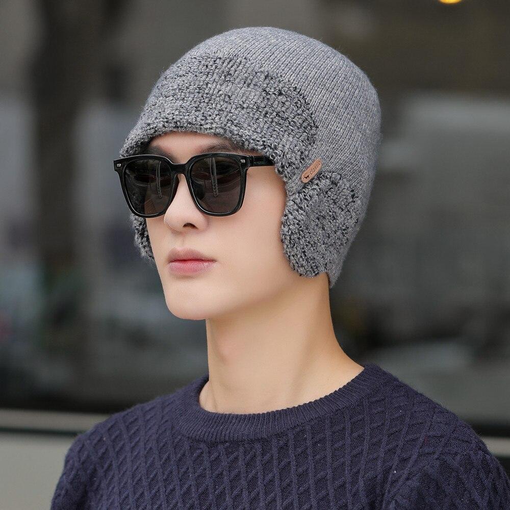 Neue Unisex-Winter-Strickmütze mit Gehörschutz, modische weiche Beanie-Mütze, für Männer und Frauen, Outdoor-Sport, Ohrenklappen-Mütze, klassisch, warm halten 55cm-62cm licht grau von Joom DACH