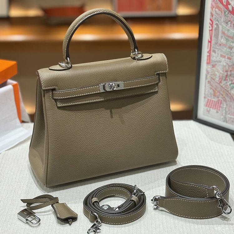 Neue trendige High-End-Tasche mit breitem Schultergurt für Damen, Oberschicht aus Rindsleder, einzelne Schulter, Umhängetasche, Nischentasche 25x11x20cm von Joom DACH