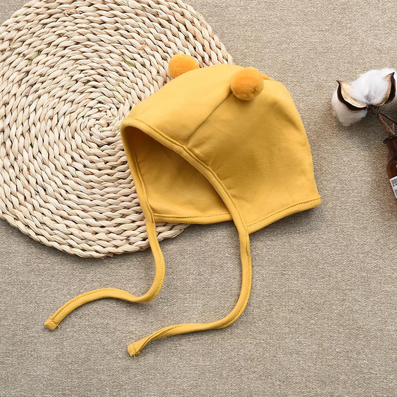 Niedliche kleine Pompom-Babymütze Einfarbig Neugeborener Junge Mädchen Ohrenschutzmütze Frühling Herbst Kleinkind Schnürung Warme Mütze gelb von Joom DACH