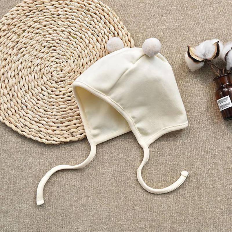 Niedliche kleine Pompom-Babymütze Einfarbig Neugeborener Junge Mädchen Ohrenschutzmütze Frühling Herbst Kleinkind Schnürung Warme Mütze weiß von Joom DACH