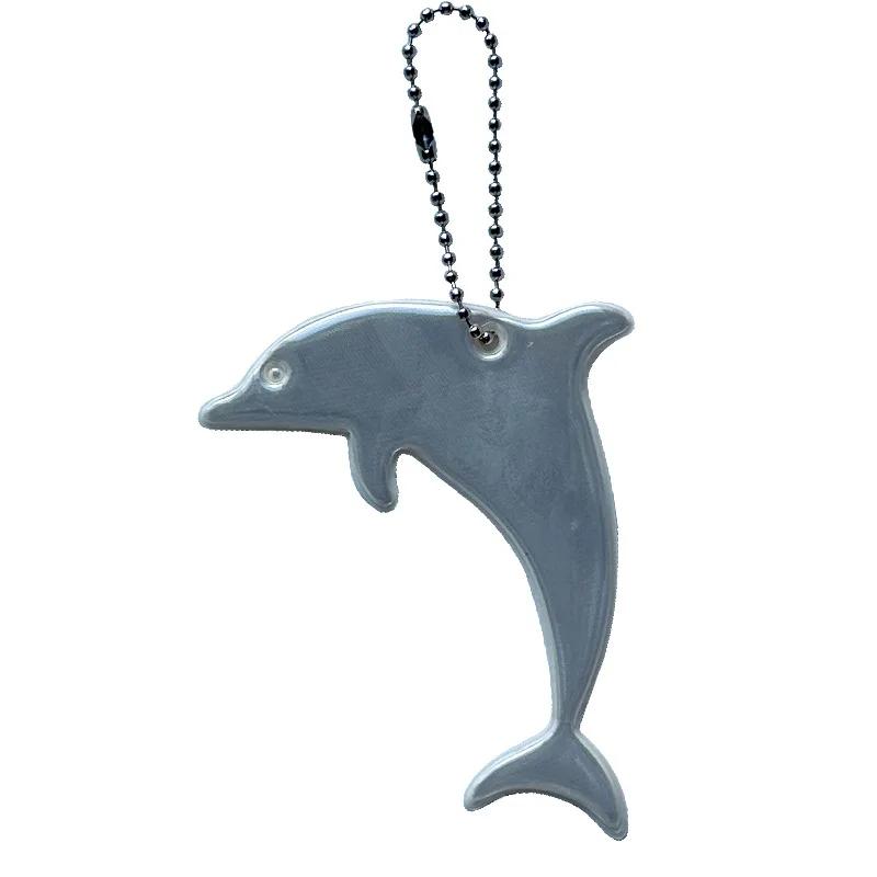 Niedlicher Sicherheitsreflektor in Form eines Delfins, reflektierende Schlüsselanhänger, Auto-Schlüsselanhänger, Charm-Taschen-Zubehör für Jacke, Rucksack, Kinderwagen, Rollstuhl weiß von Joom DACH