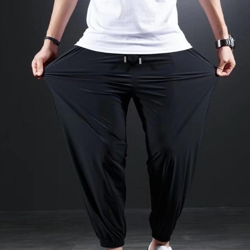 Schnelltrocknende Sommerhose aus Eisseide für Herren, ultradünne, elastische Neun-Punkt-Hose, lockere, drapierte Hose mit festem Fußbalken 6XL schwarz von Joom DACH