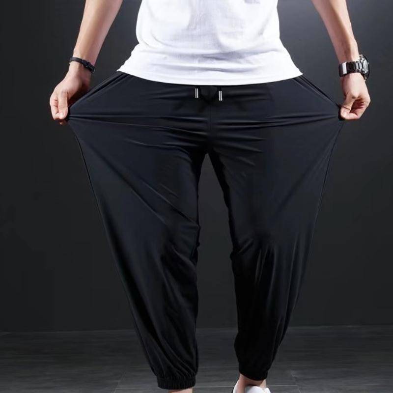 Schnelltrocknende Sommerhose aus Eisseide für Herren, ultradünne, elastische Neun-Punkt-Hose, lockere, drapierte Hose mit festem Fußbalken 6XL schwarz von Joom DACH