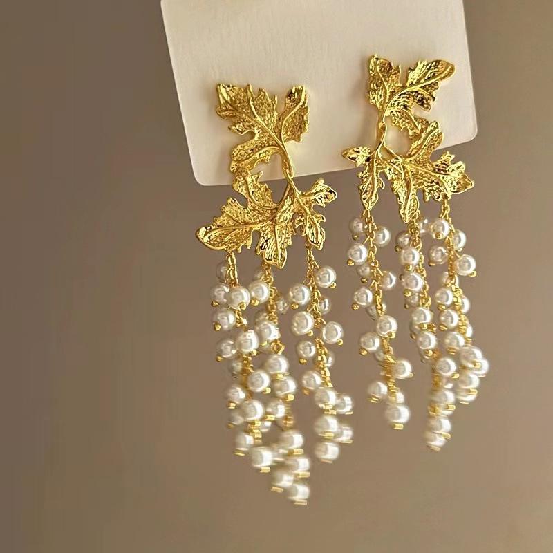 Silberne Nadelblumen-Quastenohrringe - Modische lange Hänger mit anspruchsvollem Stil von Joom DACH