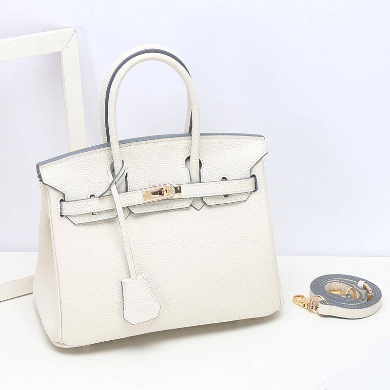 Togo Small Grain Top Layer Rindsleder Platin Tasche Damen Echtleder Modische Einzel-Schulter-Handtasche Textur Tasche 25x14x19cm luftwaffe blau von Joom DACH