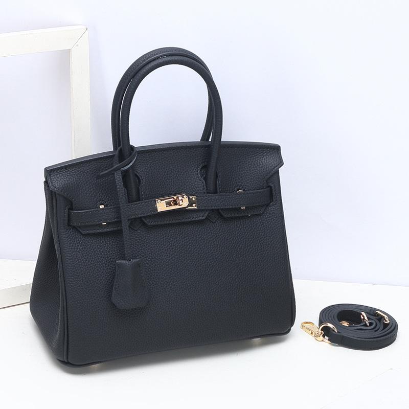 Togo Small Grain Top Layer Rindsleder Platin Tasche Damen Echtleder Modische Einzel-Schulter-Handtasche Textur Tasche 25x14x19cm schwarz von Joom DACH