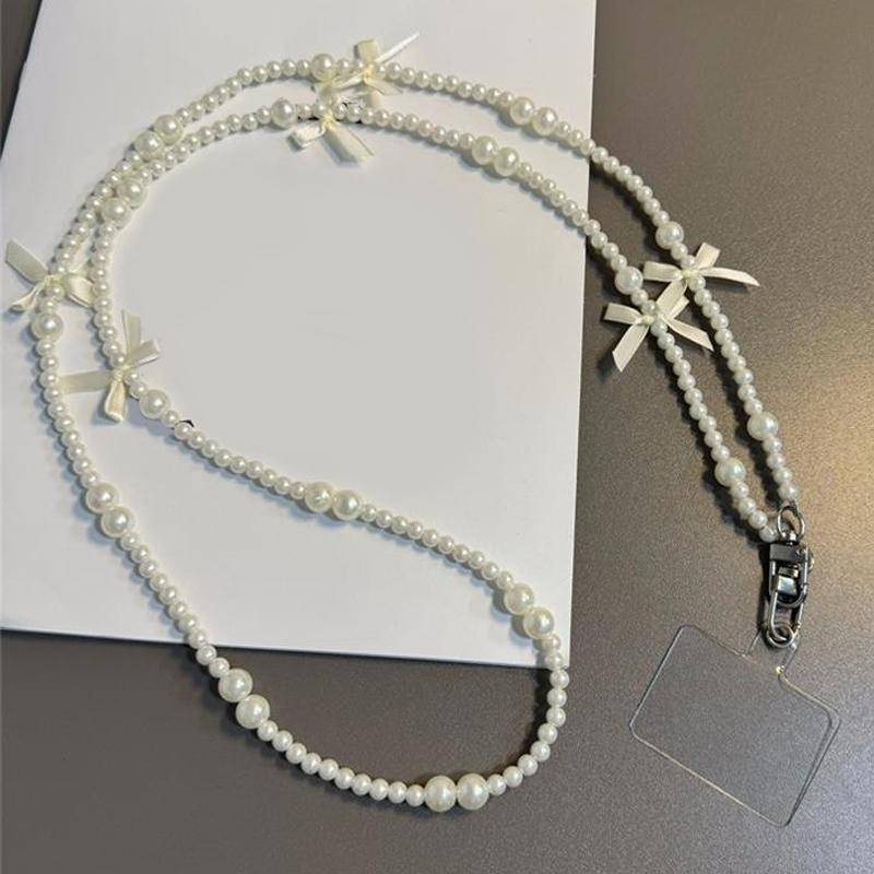 Universelles Anti-Verlust-Telefon-Lanyard mit Patch-Dichtung, lange Umhängetasche mit Perlenschleife, Handykette für Damen, langer Hals- und Schultergurt beige von Joom DACH