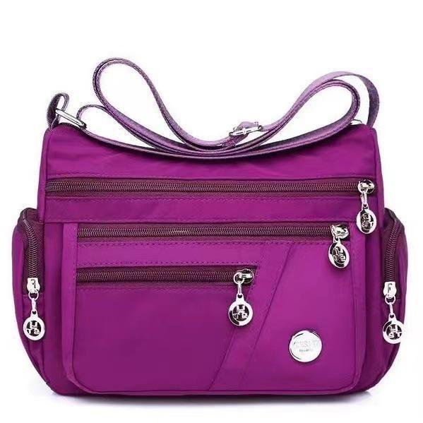 Wasserdichte Oxford-Umhängetasche mit mehreren Fächern für Damen – Stilvolles Reiseaccessoire für jedes Alter violett von Joom DACH