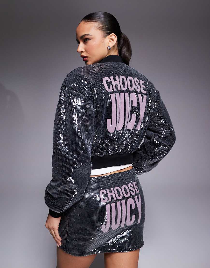 Juicy Couture - Bomberjacke in Schwarz mit durchgehendem Reißverschluss, Paillettenbesatz und Logo von Juicy Couture