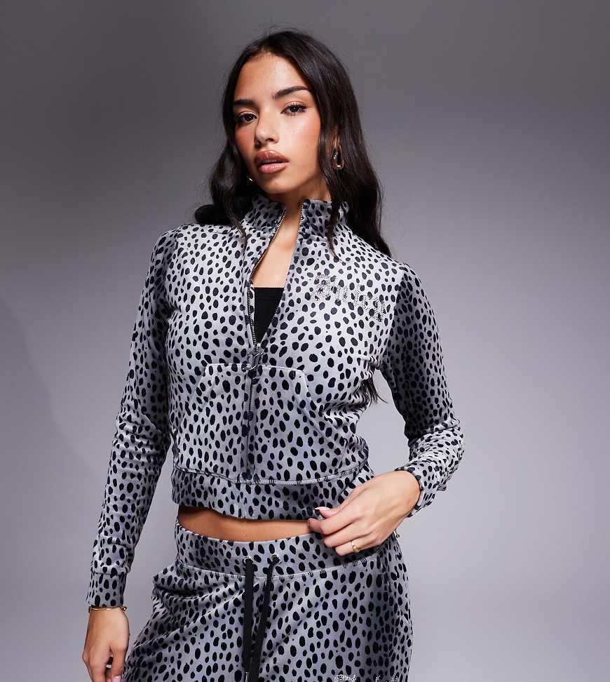 Juicy Couture x ASOS - Exklusive Kapuzenjacke mit farblich abgestimmtem schwarzem Gepardenmuster, Kombiteil-Grau Juicy Couture x ASOS - Exklusive Kapuzenjacke mit farblich abgestimmtem schwarzem Gepardenmuster, Kombiteil-Grau von Juicy Couture