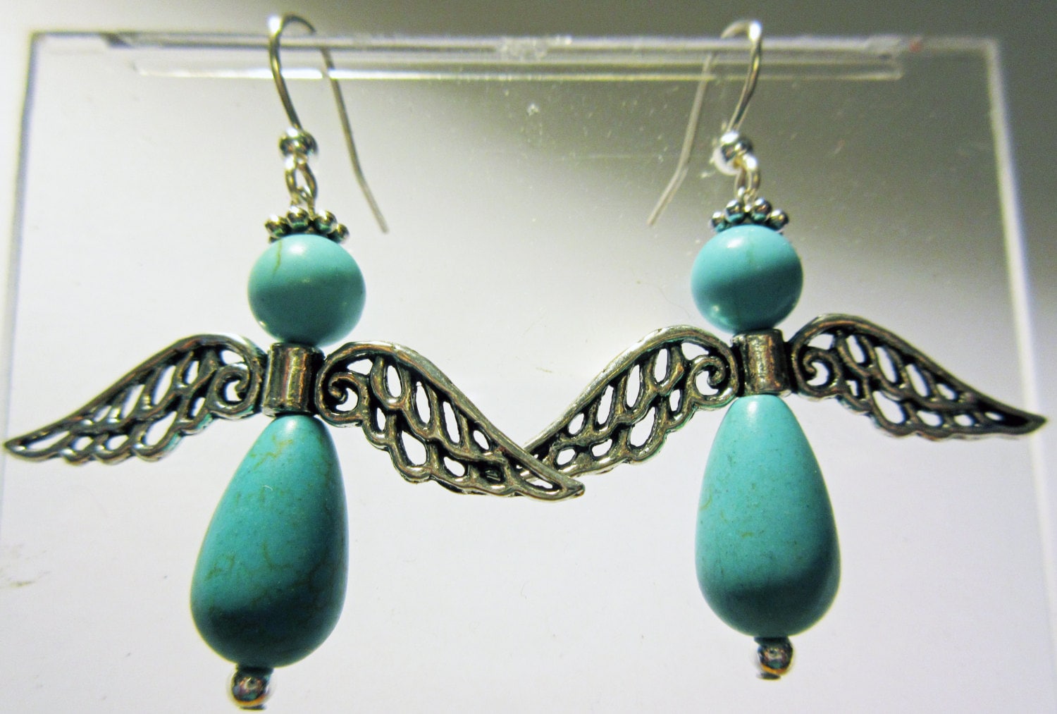 Engel Ohrringe, Aus Türkis Steinen Und Mit Silberfarbenen Haken Flügeln Engel Ohrringe, Aus Türkis Steinen Und Mit Silberfarbenen Haken Flügeln von JuliaLouiseShop