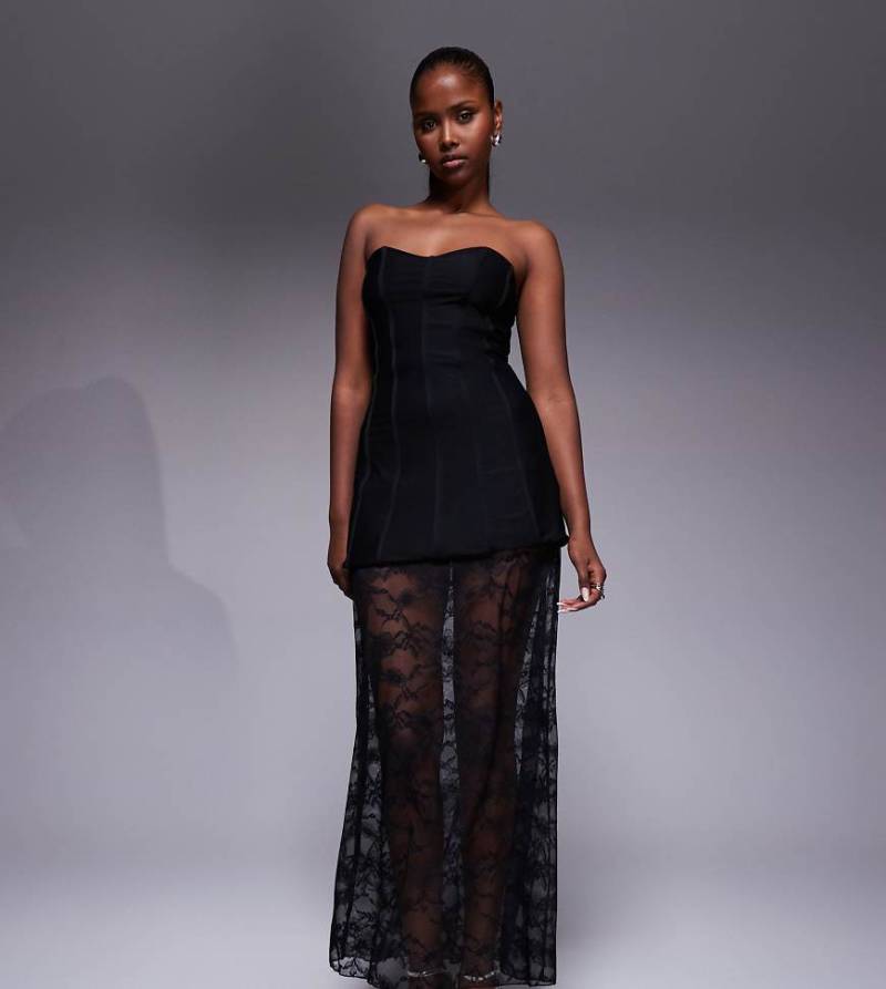 Kaiia - Exclusive - Trägerloses Maxikleid aus Spitze in Schwarz mit Strukturdesign und durchscheinendem Kontrast-Rocksaum von Kaiia