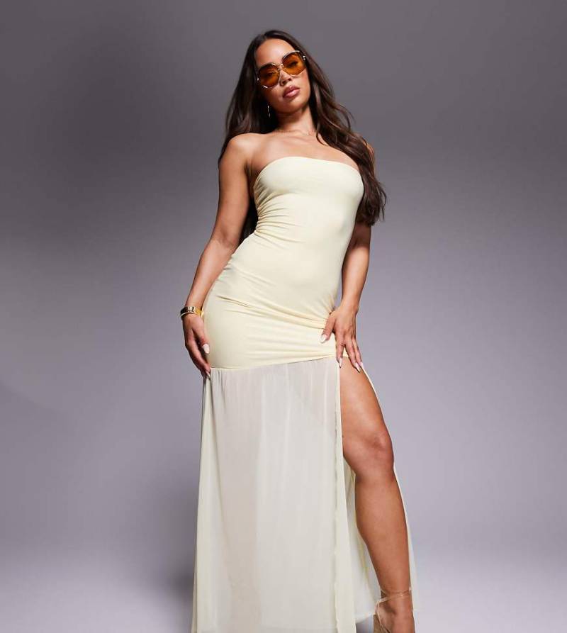 Kaiia - Exklusiv - Doppellagiges, anschmiegsames und trägerloses Maxikleid in Buttergelb mit tiefer Taille, Front-Schlitz und transparentem Saum von Kaiia