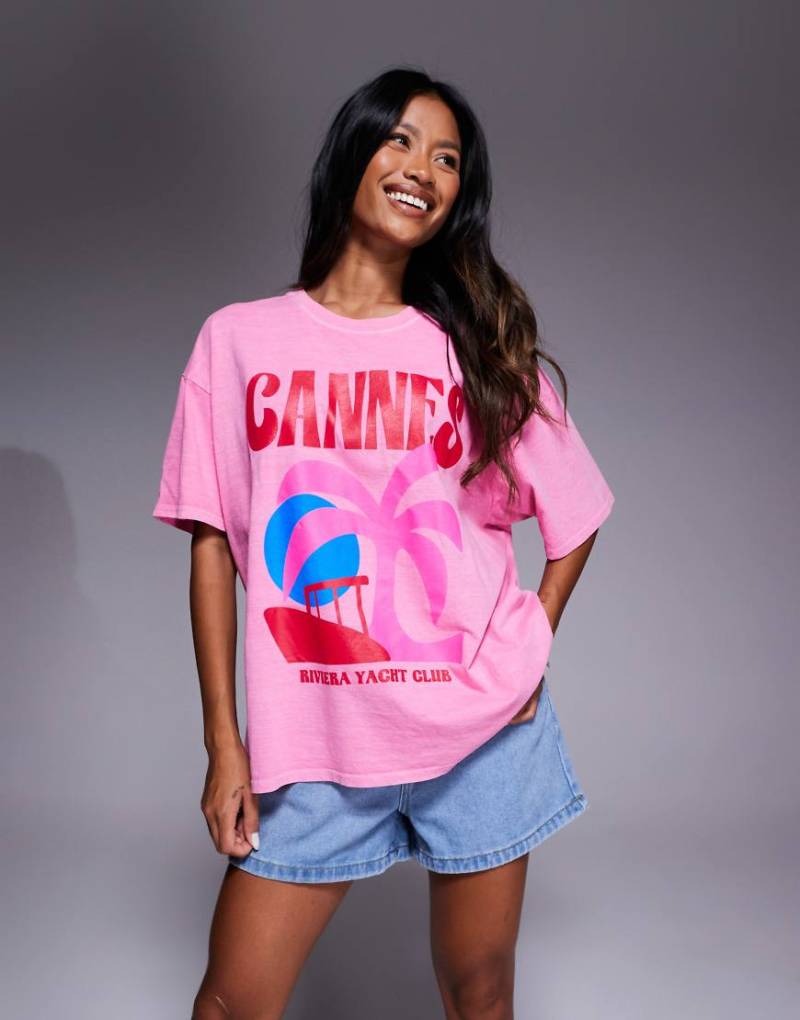 Kaiia - Exclusive - Oversize-T-Shirt aus Baumwolle in Rosa mit kontrastierendem „Cannes"-Grafikprint von Kaiia