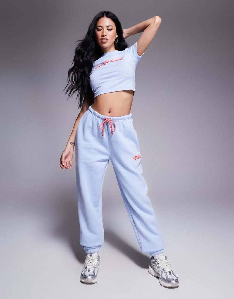Kaiia - Jogginghose aus Baumwollmix in Hellblau mit Schaumdruck-Logo in Rot und Bündchen, Kombiteil von Kaiia