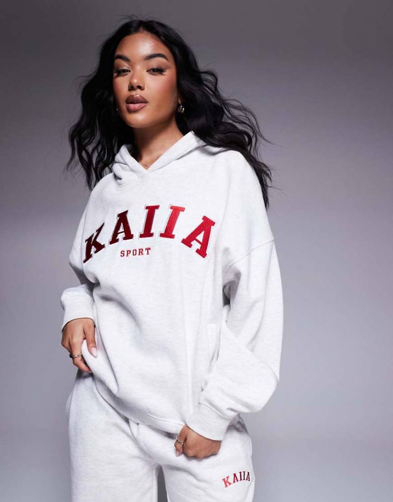 Kaiia - Kapuzenpullover in Grau meliert und Rot mit gesticktem Logo, Kombiteil von Kaiia