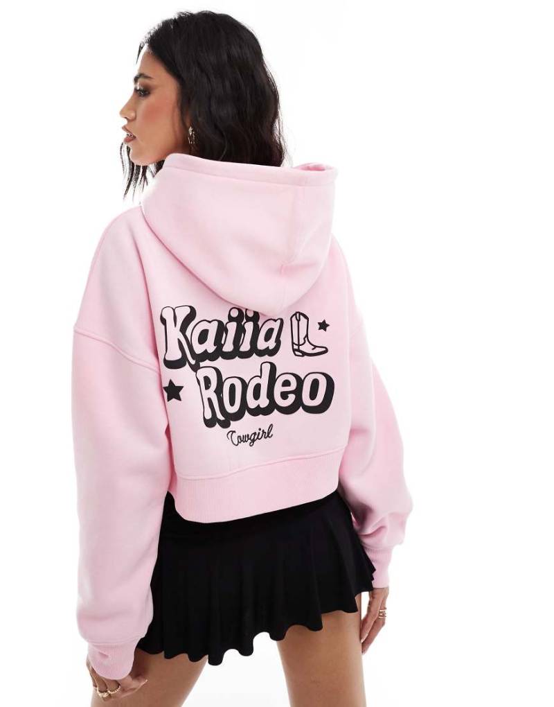 Kaiia - Cropped-Kapuzenpullover aus Baumwollmix in Rosa mit Rodeo-Bubble-Logoprint von Kaiia