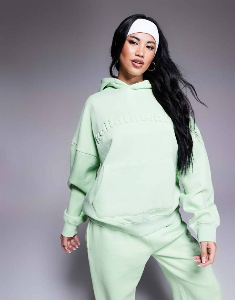 Kaiia - Oversize-Kapuzenpullover in Sherbet-Limettengrün mit Logoprägung, Kombiteil von Kaiia