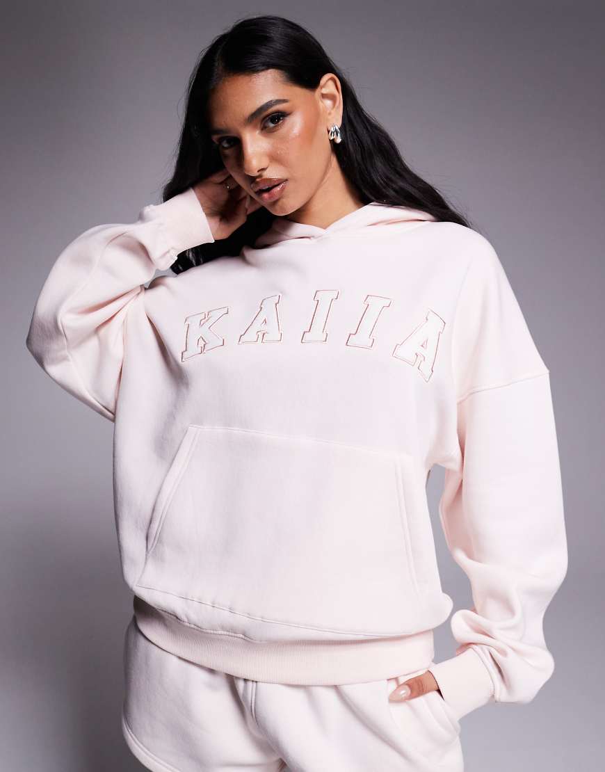 Kaiia - Oversize-Kapuzenpullover in hellem Rosé mit Logo-Stickerei, Kombiteil-Rosa Kaiia - Oversize-Kapuzenpullover in hellem Rosé mit Logo-Stickerei, Kombiteil-Rosa von Kaiia
