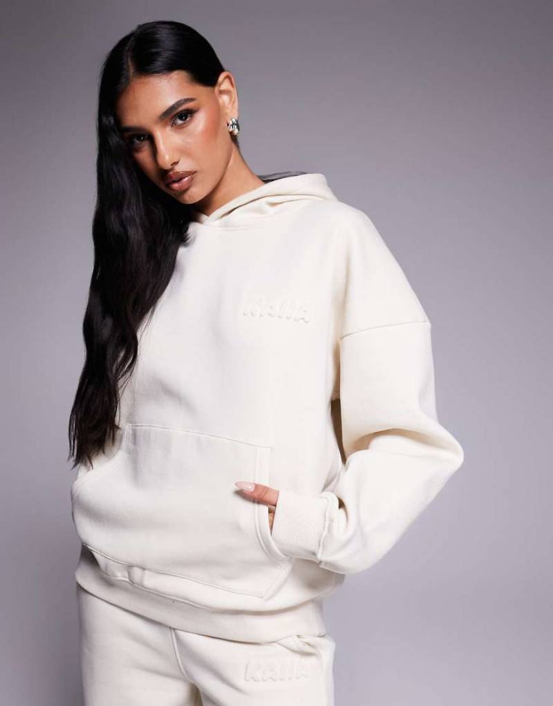 Kaiia - Oversize-Kapuzenpullover mit hohem Baumwollanteil in milchigem Hellbeige mit eingeprägtem Bubble-Logo, Kombiteil-Neutral von Kaiia