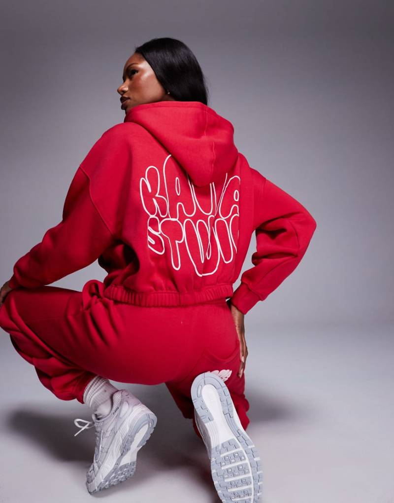 Kaiia Studio - Kapuzenjacke aus Baumwollmix in Rot mit Reißverschluss und Bubble-Logo auf dem Rücken, Kombiteil von Kaiia