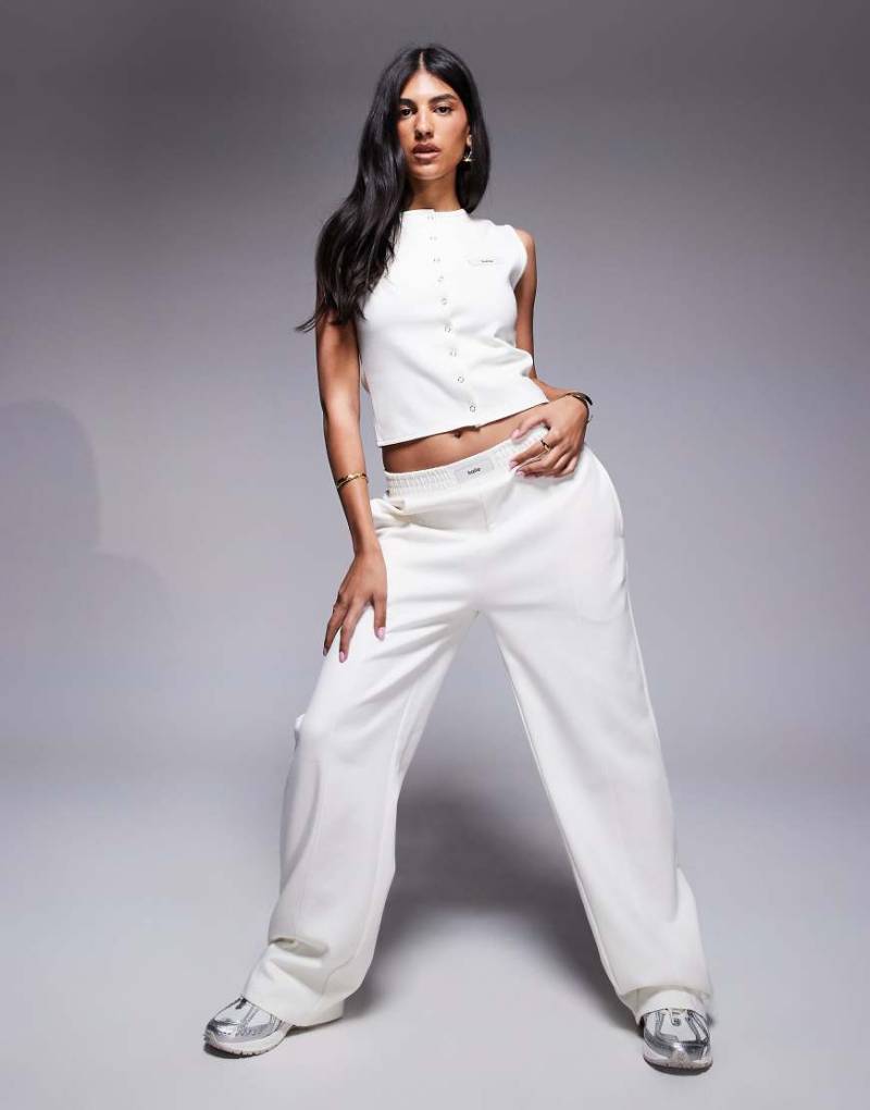 Kaiia - Jogginghose aus Baumwollmix in Creme mit Logo-Detail, weitem Bein und Ziernaht vorne, Kombiteil-Weiß von Kaiia