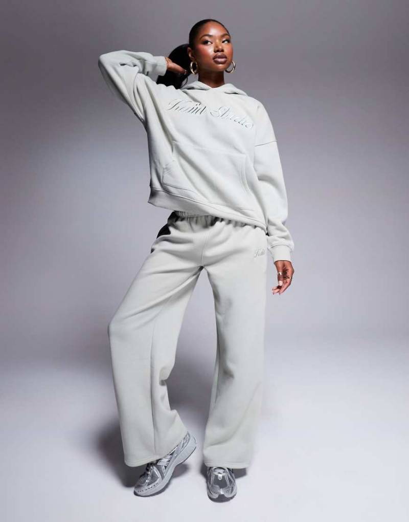 Kaiia - Jogginghose aus Baumwollmix in Matcha-Grün mit „Studio"-Logo und weitem Bein, Kombiteil von Kaiia