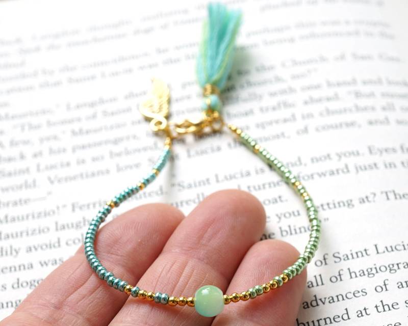 On Vacation Mintgrün Geschenk Quaste Armband Dünnes Gold Engel Flügel Charme Boho Freundschaft Winziges Samenperlenarmband Minimal On Vacation Mintgrün Geschenk Quaste Armband Dünnes Gold Engel Flügel Charme Boho Freundschaft Winziges Samenperlenarmband Minimal von KapKaDesign