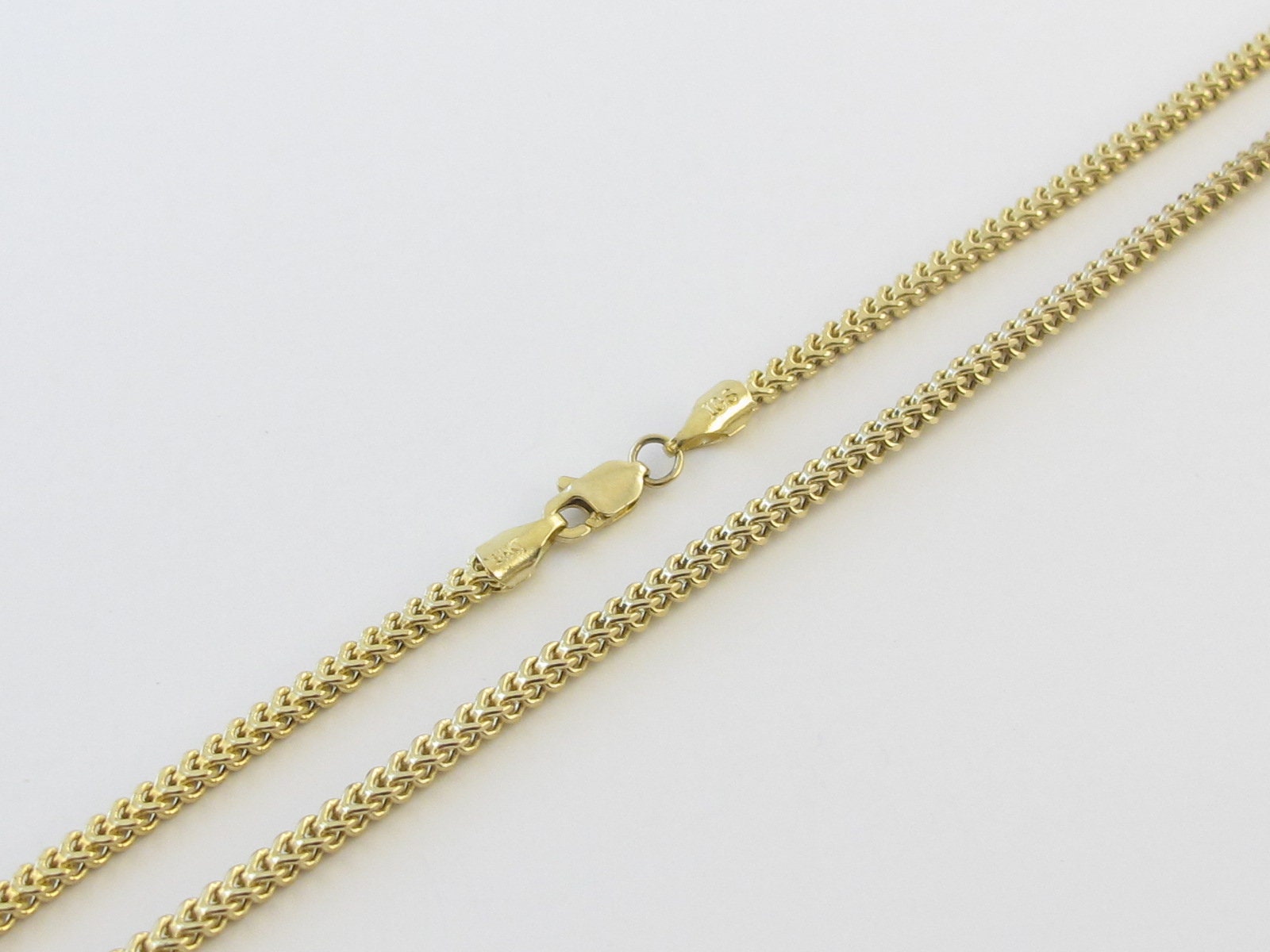 14K Gelbgold Herren Franco Gliederkette Halskette 24 "9, 1 Gramm 2 Mm Breit 14K Gelbgold Herren Franco Gliederkette Halskette 24 "9, 1 Gramm 2 Mm Breit von Karatcaratjewelry