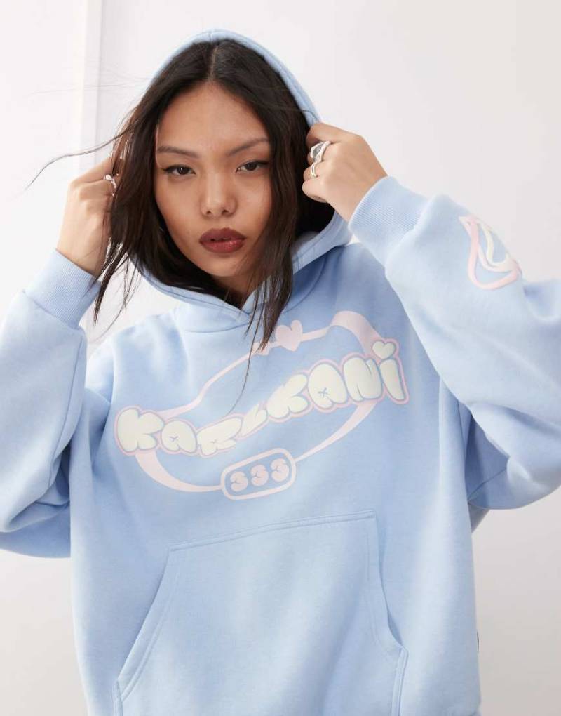 Karl Kani - Kapuzenpullover in Hellblau mit Herz-Logoprint von Karl Kani