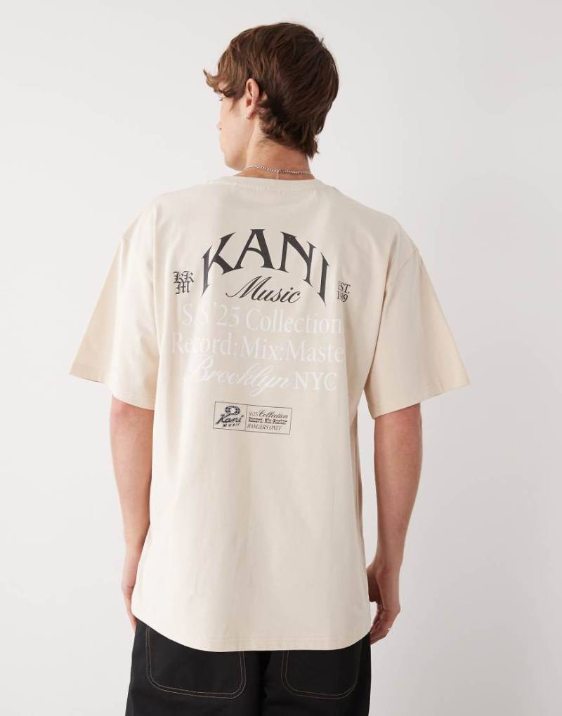 Karl Kani - Oversize-T-Shirt in Beige mit Musik-Print auf Brust und Rücken und Signatur-Logo-Neutral von Karl Kani