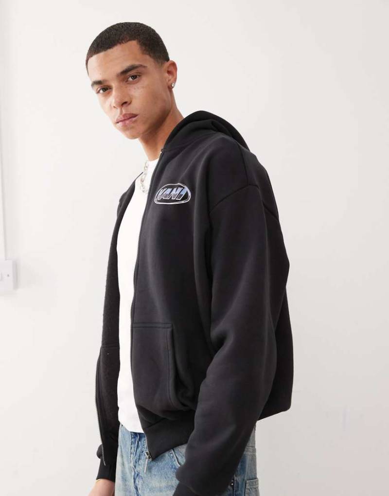 Karl Kani - Signature - Kapuzenjacke in Schwarz mit Reißverschluss, Chrom-Logo und Rücken-Print von Karl Kani