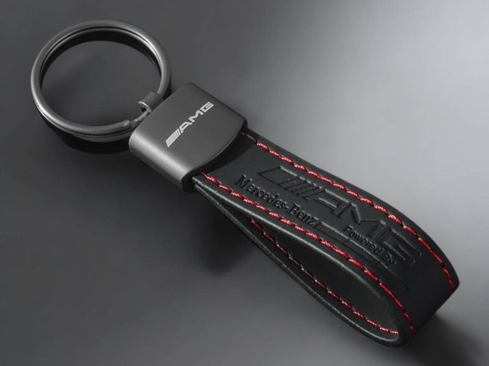 Mercedes Amg Schlüsselanhänger Mit Amg-Logo in Schwarz Roten Nähten Mercedes Amg Schlüsselanhänger Mit Amg-Logo in Schwarz Roten Nähten von KeyCraftDE