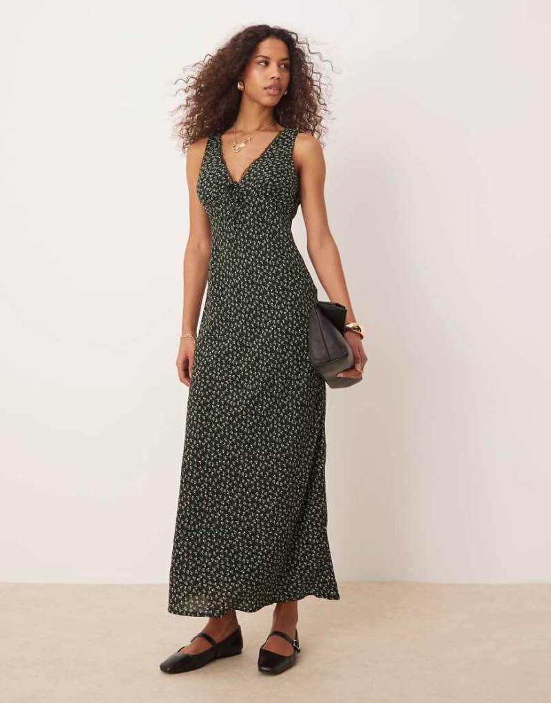 Kiss The Sky - Maxikleid in Schwarz mit Blumenprint von Kiss The Sky