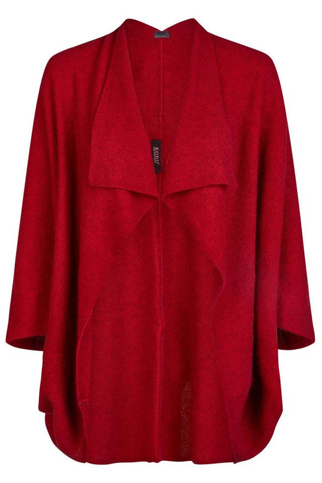 Koru Knitwear Strickcape Shrug mit Moosmaschen in Unifarbe Koru Knitwear Strickcape Shrug mit Moosmaschen in Unifarbe von Koru Knitwear