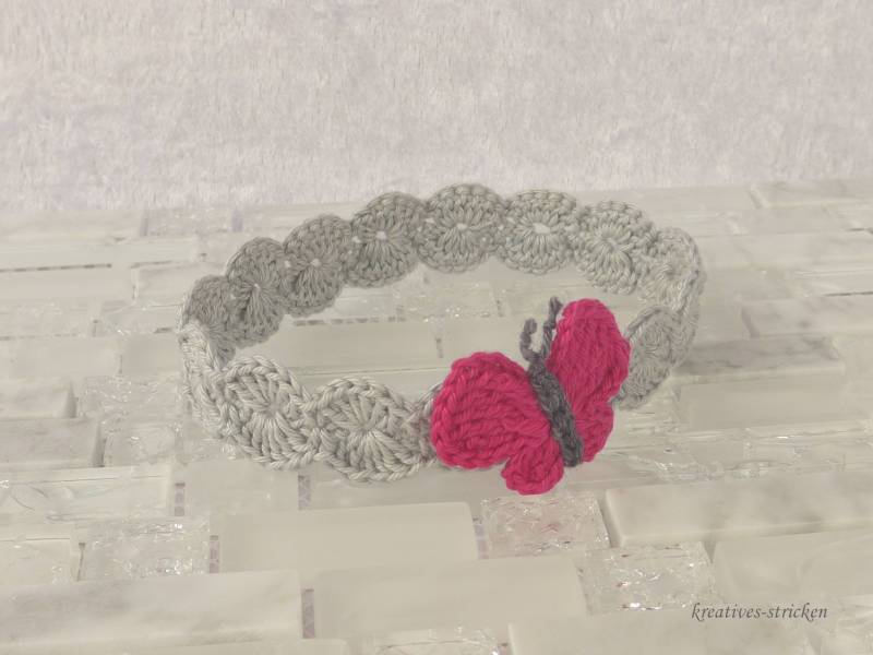 Gehäkeltes Babyhaarband Schmetterling Gehäkeltes Babyhaarband Schmetterling von KreativesStricken